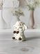 Mini sitting sheep